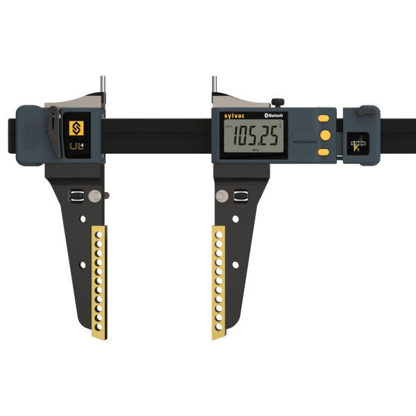 A digital caliper measuring device with a black and gray body, yellow accents, and a digital display screen, shown against a solid white background.