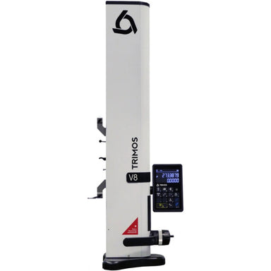 A Trimos V8 laser tracker machine with a white vertical column, black base, a digital control screen, and a red safety triangle on a plain white background.