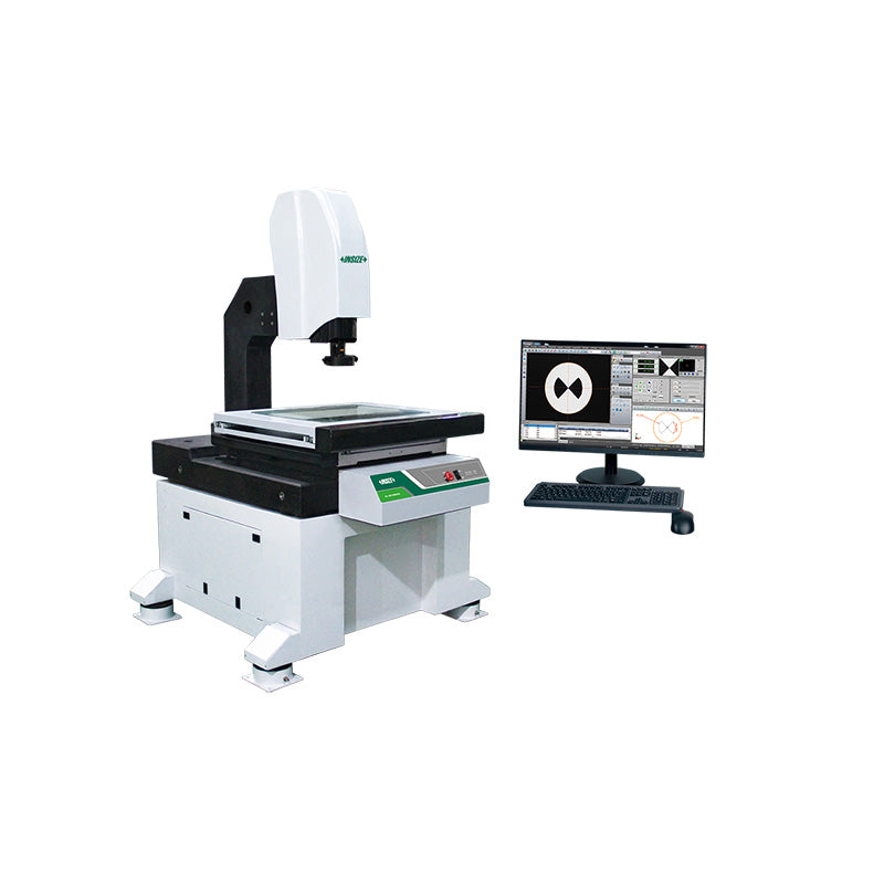A white and black optical coordinate measuring machine with an attached monitor and keyboard, shown on a plain white background.